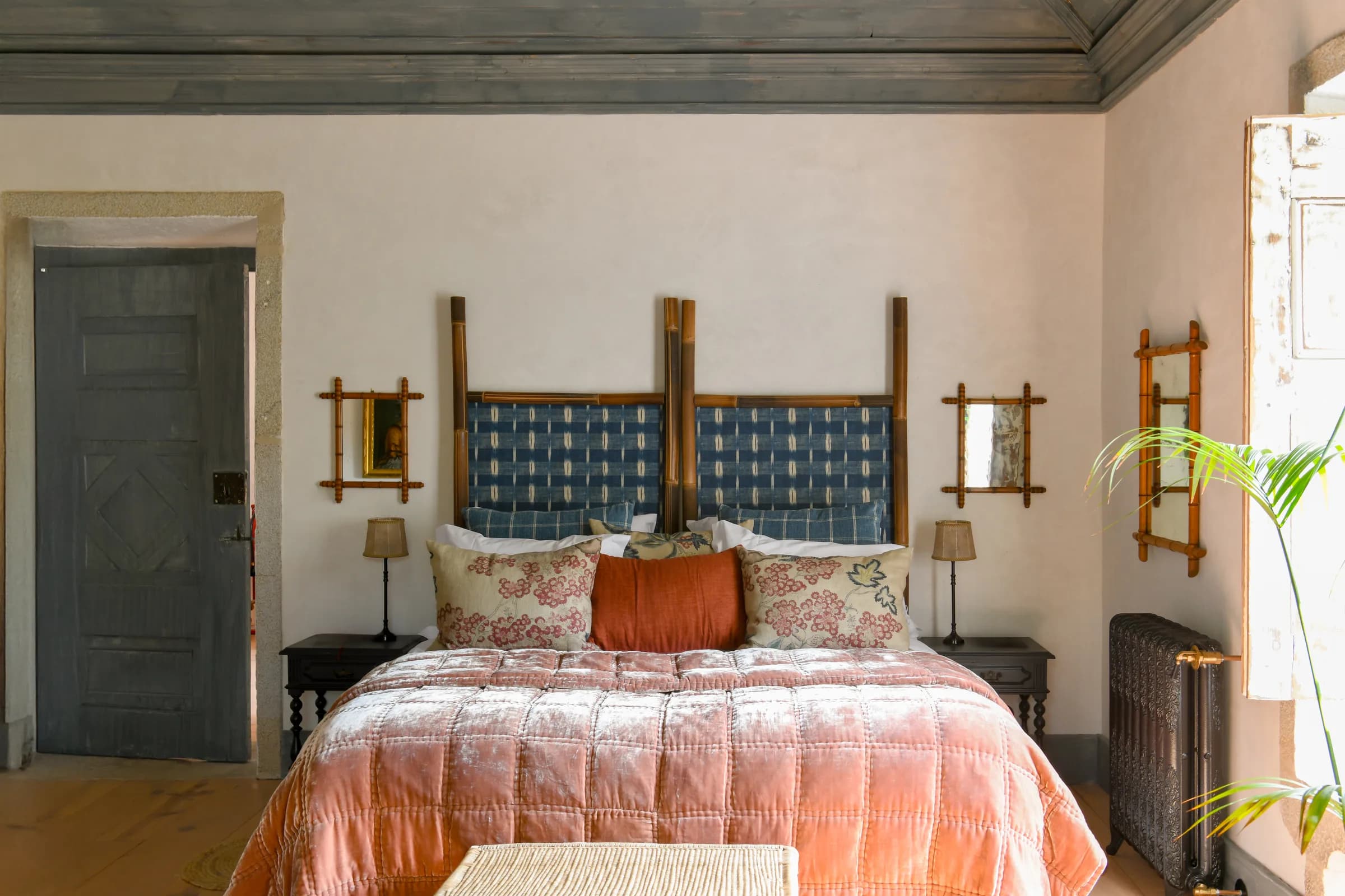 The Dahlia suite — the bed and the cottage-style cupboard