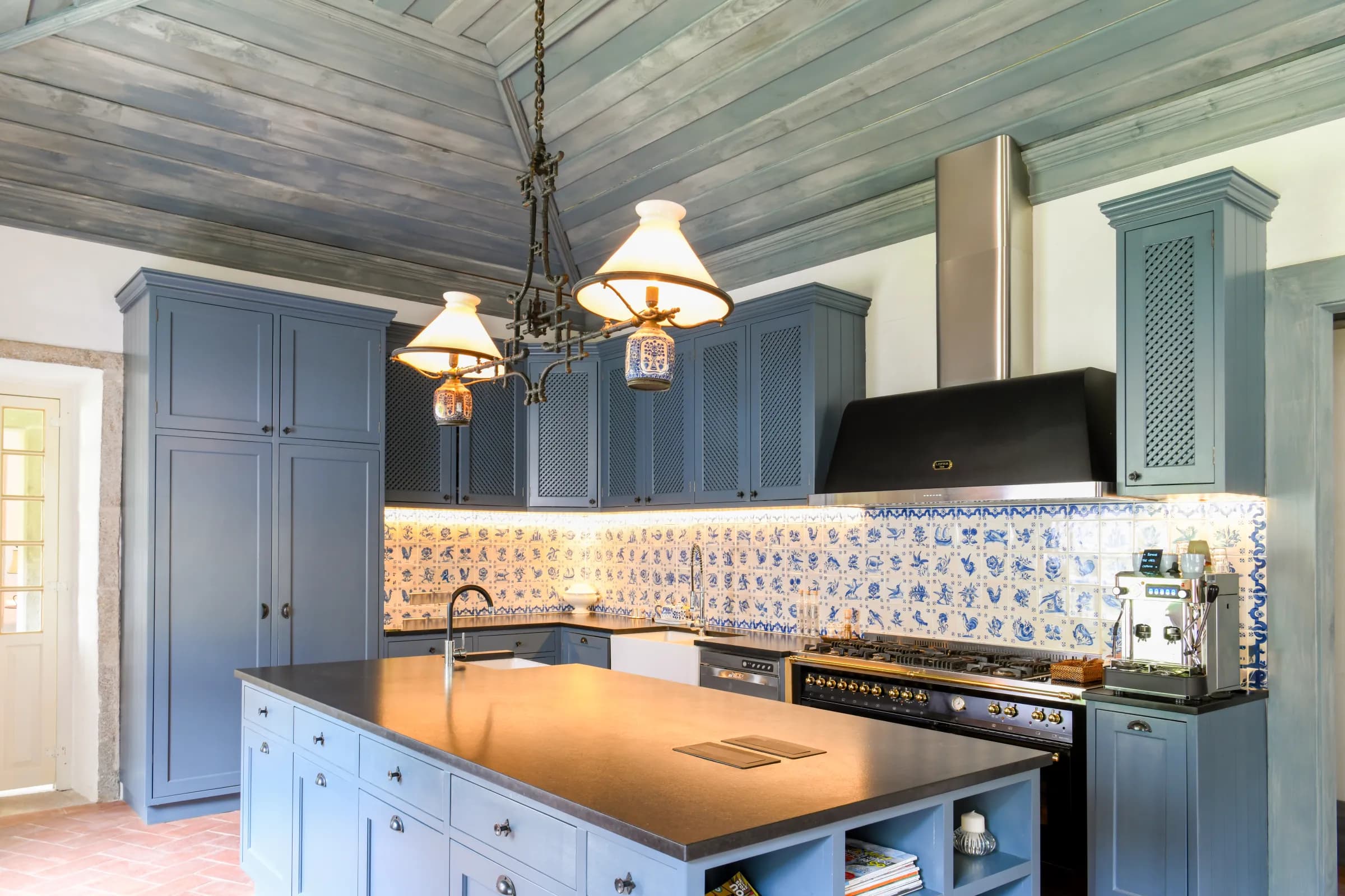 The Blue Kitchen with its azulejo tiles and dusty-blue cabinetry
