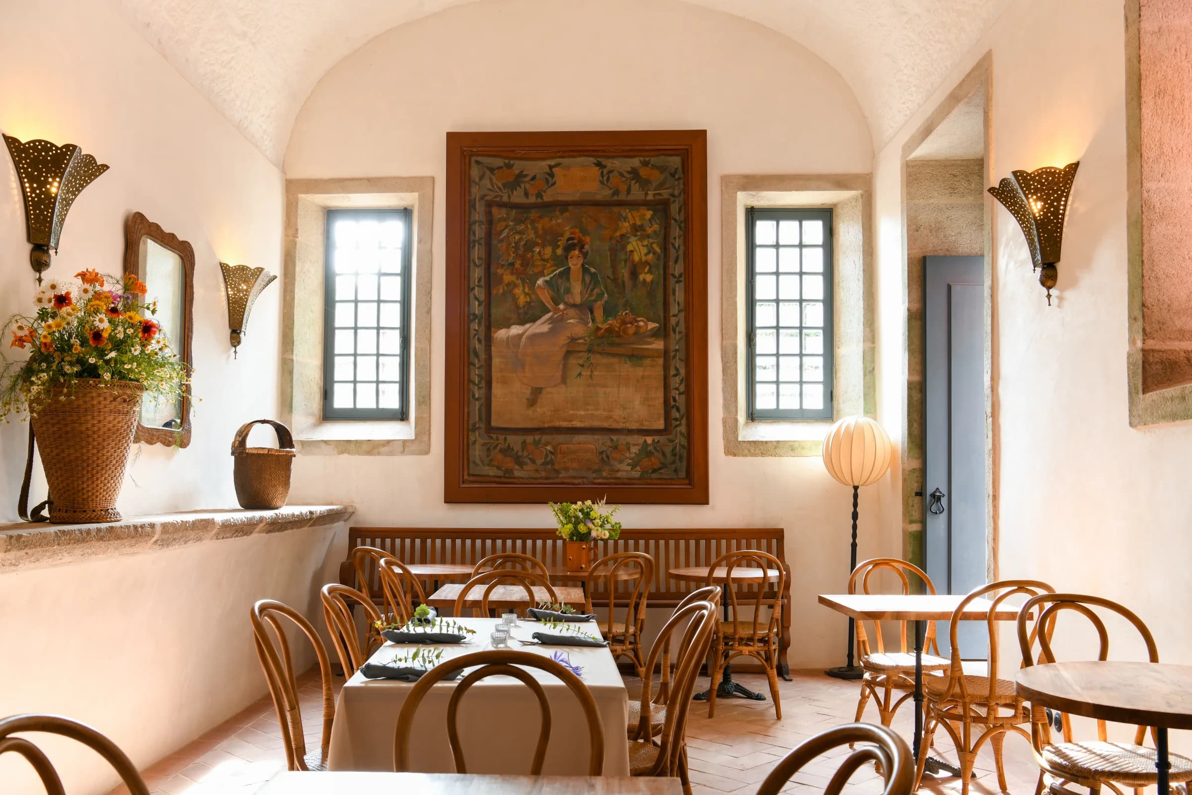 The former monks' refectory, tables set beneath its vaulted ceiling